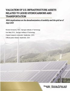 Report cover - Image of solar array with wind turbines and mountains in the background.